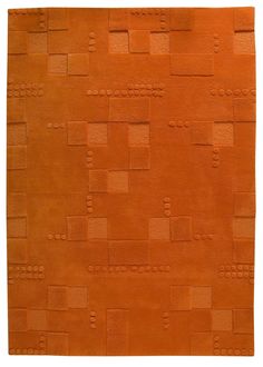 an orange area rug with squares and rectangles