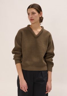 A relaxed fit ribbed sweater in style featuring a v-neckline with slightly puffy edges.    100% wool    photographed in size small:  body length 21"  chest width 22"  sleeve length from shoulder 20" Cashmere Wool, Engineered Garments, Sweater Sale, Ribbed Sweater, Designer Outfits Woman, Wool Sweaters, Women Pullover, Work Fashion, Cotton Linen