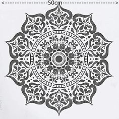 an intricate design is shown on the side of a white paper with black and white ink