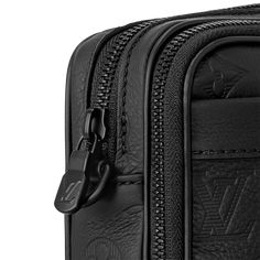 LOUIS VUITTON® - Alpha Wearable Wallet - Black Black Leather Wallet With Embossed Logo, Black Bags With Embossed Logo For Formal Occasions, Black Formal Bag With Embossed Logo, Black Formal Bags With Embossed Logo, Formal Black Bags With Embossed Logo, Black Luxury Rectangular Wallet, Black Business Wallets With Embossed Logo, Luxury Black Wallets With Coin Pocket, Luxury Black Wallet With Coin Pocket