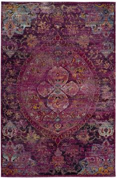 a purple rug with an ornate design on the middle and bottom, in various colors