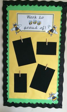 a bulletin board with pictures pinned to it and the words work to proud aff