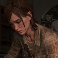 the last of us character looking at something in front of her, holding a knife