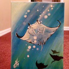 a painting of a manta ray swimming in the ocean with fish on it's back