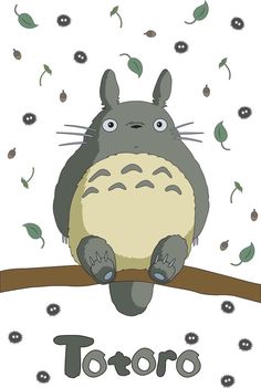 a totoro sitting on top of a tree branch