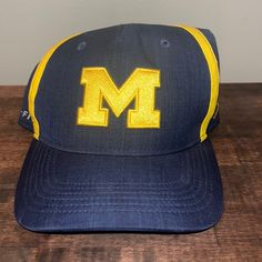 Nwot Michigan Dri Fit Jordan Hat Nike Baseball Cap, One Size Fits Most, Yellow Sports Hat With Curved Brim, Yellow Cap For Sports Events, Yellow Flat Bill Hat, One Size Fits Most, Yellow Flat Bill Hat, Yellow Curved Brim Sports Hat, Collegiate Blue Cap, Collegiate Blue Cap Hats, Collegiate Blue Baseball Cap