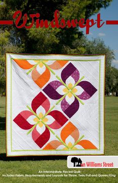 an image of a quilt on the grass