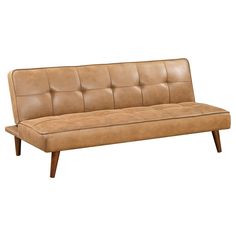 a tan leather couch with wooden legs