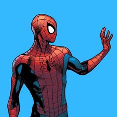 the spider - man is standing in front of a blue background with his hands out