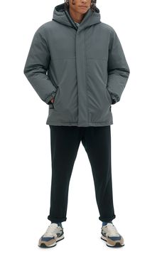 A warm insulated coat that is fitted with a hood and zipper pockets, with a shell that will shield you from conditions up to -15°C/5°F. 32" Length (size M) Attached hood Long sleeves Zipper front Dual zipper pockets Solid Woven Fully lined Shell: 100% polyester; lining: 100% synthetic filling Machine wash, line dry Imported Model stats: 6'1" height, 32" waist. Model is wearing size M. Gray Puffer Jacket With Pockets For Cold Weather, Weatherproof Long-sleeve Down Parka, Gray Hooded Puffer Jacket With Detachable Hood, Hooded Down Parka, Gray Hooded Weatherproof Outerwear, Gray Weatherproof Hooded Outerwear, Waterproof Down Outerwear, Weatherproof Hooded Down Outerwear, Gray Hooded Puffer Jacket For Outdoor Activities