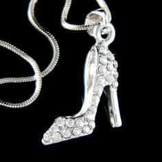 PERFECT CHRISTMAS GIFT /WEDDING GIFT FOR BRIDE / BRIDEMAID / LADY! You are getting a Princess Slippers Princess High Heel Shoe Necklace Pendant inlayed with Swarovski crystals. It comes with a FREE 16" Original Rhodium Plated Snake Chain necklace with lobster clasp.  Pendant size is 11/16" wide X 1 1/8" high (17mm X 29mm) Crystal Color: Crystal Clear Prices are in US$. For shipping policies and other important information, click on "profile" on the right. See an item that you like but has alread Crystal Princess, Small Fringe, Magical Gifts, Fairy Tale Jewelry, Cinderella Slipper, Mens Cross Necklace, Wedding Charm, Glass Slippers, Sterling Silver Cross Necklace