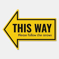 this way sign with an arrow pointing to the right and below it says, please follow the arrows