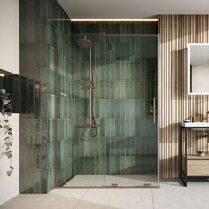 a bathroom with a walk in shower next to a sink and a mirror on the wall