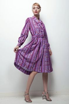 purple aztec print 70s shirtwaist dress striped pleated long sleeve LARGE L Relaxed Fit Long Sleeve Pleated Dresses, Striped Long Sleeve Dress With Relaxed Fit, Striped Long Sleeve Relaxed Fit Dress, Purple Fitted Collared Dress, Fitted Purple Collared Dress, Fall Long Sleeve Dress With Accordion Pleats, Fall Dresses With Accordion Pleats And Long Sleeves, Retro Long Sleeve Striped Dress, Vintage Long Sleeve Striped Dresses