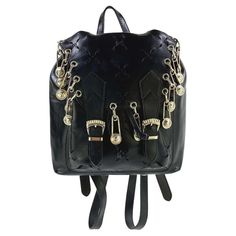 S/S 1994 Gianni Versace Safety Pin Cut Out Black Leather Mini Runway Backpack | From a unique collection of rare vintage Backpacks at https://www.1stdibs.com/fashion/handbags-purses-bags/backpacks/. Alternative Travel Bags, Punk Style Standard Backpack For Everyday Use, Alternative Style Everyday Backpack, Punk Style Backpack With Adjustable Strap, Punk Backpack With Zipper Closure, Punk Style Backpack With Zipper Closure, Punk Style Standard Travel Backpack, Punk Style Travel Backpack, Edgy Standard Backpack For Travel