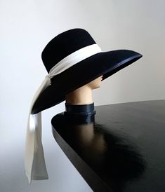 A classical New Look shape hat with Audrey vibes. Hand made to measure. Diameter: cca 42 cm Crown depth: cca 10 cm Available only in black at the moment Audrey Hepburn Hat, Audrey Hepburn Inspired, Cloche Hats, Breakfast At Tiffany's, Elegant Hats, White Scarves, Hat Ideas, Fancy Hats, Breakfast At Tiffanys