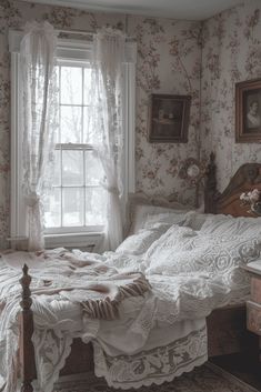 an old fashioned bedroom with floral wallpaper and white bedding