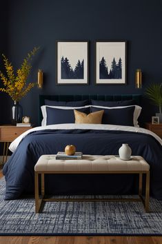 a bedroom with dark blue walls and white bedding