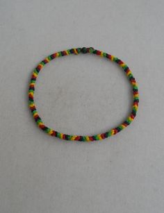 Custom order for DirkKnotted macrame rasta by LuckyRatJewellery, €2.00 Casual Multicolor Fair Trade Bracelets, Casual Multicolor Braided Bracelets For Festival, Casual Handmade Multicolor Anklets, Adjustable Multicolor Traditional Anklet, Traditional Adjustable Multicolor Anklets, Casual Fair Trade Friendship Bracelets For Beach, Casual Black Handmade Anklets, Guy Bracelets, Rat Jewellery