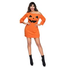 a woman in an orange dress with a pumpkin face on the chest and black boots