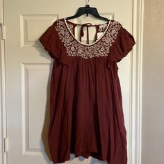 Dress Or Long Top With Keyhole Back And Pocketsearthy Rust Color With White Embroidery Spring Burgundy Cotton Dress, Burgundy Cotton Dress For Spring, Casual Red Mini Dress With Floral Embroidery, Casual Burgundy Mini Dress For Spring, Casual Burgundy Short Sleeve Dress, Red Lace Trim Dress For Vacation, Casual Burgundy Summer Dress, Burgundy Beach Dress For Summer, Casual Red Embroidered Mini Dress