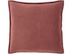 a pink pillow with a brown border