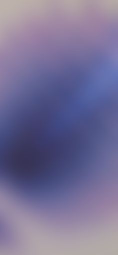 an abstract blurry background in blue and purple