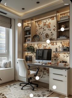 a home office with floral wallpaper and built - in shelving units for storage