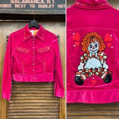 "Vintage 1960's Pink Velvet Mod Raggedy Ann Design Cropped Jacket. Tag Size 14. Please check the measurements below. Very good condition. The label is \"Little Bits\". Original 1960's. Pink velvet trucker jacket with rhinestones details and Raggedy Ann on back panel. All Sales Final. Please ask any questions before purchase. Take a look at our Store for more Vintage Clothing - VintageOnHollywood. MEASUREMENTS Shoulder to Shoulder: 16\" Underarm to Underarm: 17 1/4\" Outer Sleeve Length (shoulder Retro Spring Denim Jacket With Patches, Retro Denim Jacket With Patches, 80s Patch Jacket, Lount Pink Retro Velvet Jacket, Pink Patchwork Retro Outerwear, 70’s Disco, Disco Shirt, Disney Embroidery, Raggedy Ann