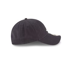 a black baseball cap with white stitching on the front and side panels, sitting against a white background