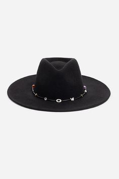 Crafted from 100% wool, the Beaded Hat is available in rich black. Featuring a mid-height crown and a wide, flat brim, this stunning hat is finished with a simple band accented with decorative beaded details. Pair with a fit-and-flare maxi dress and western style boots for a hint of bohemian style. Johnny Was Women's Beaded Hat in Black Evening Hats With Flat Brim For Fall, Elegant Black Fedora With Flat Crown, Flat Brim Evening Hats For Fall, Flat Brim Hats For Evening In Fall, Flat Brim Hats For Evening And Fall, Elegant Black Hat With Flat Crown, Wool Flat Brim Party Hat, Wool Party Hat With Flat Brim, Party Wool Hat With Flat Brim