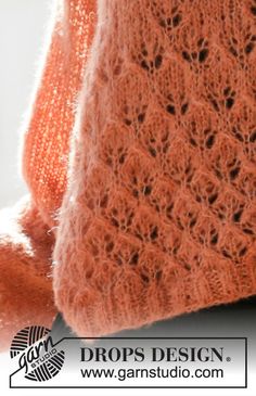 an orange knitted shawl is shown with the words drops design written below it