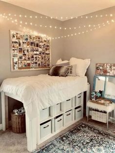 a bedroom with lights strung above the bed