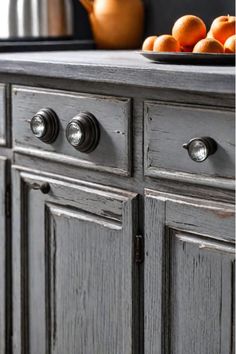 Distressed farmhouse cabinet doors with vintage knobs Painted Kitchen Cabinets, Sleek Cabinet, Farmhouse Kitchen Cabinets, Kitchen Transformation