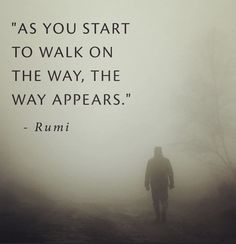 a person walking in the fog with a quote from rumi