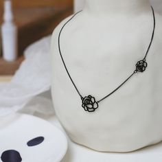 ✦ Embrace the romantic allure of our Roses Clavicle Necklace, featuring one small and one big rose pendant, available in either elegant gold or sleek black. Plated in luxurious 18K gold, this necklace exudes timeless charm and sophistication. Elevate your ensemble with the delicate beauty of roses, perfect for adding a touch of romance to any outfit.----------- DETAILS ------------ Color: Gold/ Black- Chain Length: 37cm- Materials: 18K Gold Plated, Titanium Steel- SKU: P541 Elegant Black Flower Pendant Necklace, Elegant Black Necklace With Flower Pendant, Delicate Black Necklace For Gift, Black Necklace With Rose Design As Gift, Black Necklace With Rose Design For Gift, Elegant Black Jewelry With Rose Design, Rose Choker, Delicate Beauty, Rose Pendant