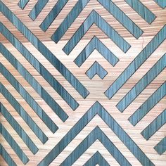 a close up view of a wooden surface with an intricate design