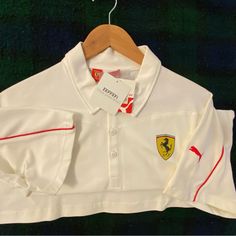 World Famous Ferrari Polo Shirt By Puma, New With Tags Men’s Size 8 A Beautiful Sports Shirt Iconic Ferrari Label White Polo Collar Top For Sports Season, White Polo Collar Top For Sports, White Collared Top For Sports Events, Casual Long Sleeve Sports Polo Shirt, White Polo Collar Sports Top, Casual White Golf Tops, White Long Sleeve Golf Tops, Sporty Golf Tops With Logo Print, Ferrari Polo Shirt