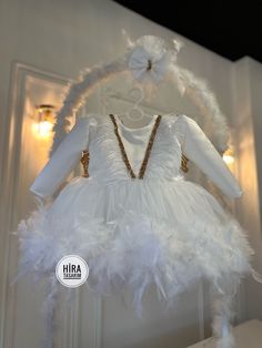 "🕊️👗✨ \"White Gold Feather Baby Girl Dress, Wedding Tutu Dress\" ️ Make your little angel the star of the show with our stunning White Gold Feather Baby Girl Dress! 🌟💖 This elegant and enchanting wedding tutu dress is sure to capture everyone's hearts! 💕👑 🌟 Features: 👗 Soft and luxurious fabric for ultimate comfort 🕊️ Beautiful gold feather embellishments for a touch of elegance ✨ Sparkling sequins that will make her shine like a star 💖 Fluffy tutu skirt for a dreamy and whimsical look Enchanting Wedding, Puffy Dresses, Dress Tulle, Gold Feathers, Luxurious Fabric, Bow Dress, Dress Order, Dress Prom, Prom Party