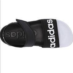 Adidas Women's Adilette Sandal Slide, Core Black/White/Core Black, 5 *New With Box, Never Worn! Open To Offers. Black Adidas Logo Sandals, Adidas Synthetic Sport Sandals For Spring, Black Adidas Slides For Summer, Summer Black Adidas Sandals, Adidas Sandals With Logo, Synthetic Material, Adidas White Sandals For Sports, Adidas Sandals For Summer Sports, Adidas Open Toe Sport Sandals For Summer, Black Adidas Sandals For Summer