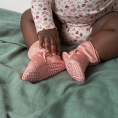 Your baby girl will love these comfortable, pink booties with white heart pattern and poly-fleece lining designed to keep her little feet warm. Featuring a non-skid cotton canvas sole to provide extra balance support and secured with an extra-large hook and loop strap, these baby booties give a comfortably secure feel. A heel loop makes it easy to remove them when needed and minimizes wear and tear on the booties. Our essentials have been independently certified with STANDARD 100 by OEKO-TEX® so Pink Booties, Gerber Baby, Pink Hearts, Fabric Tape, Heart Pattern, White Heart, Baby Booties, Pair Of Pants, Toddler Sizes