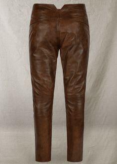 Men's Distressed Leather Pant In Dark Brown Embrace the rugged elegance of our men's distressed leather pant in dark brown. Meticulously crafted from durable cowhide with a semi-aniline finish, these biker jeans are designed to stand the test of time. The unique front straps add an edgy twist, ensuring you stand out in any crowd. Perfect for the adventurous spirit, they combine the essence of freedom with a touch of rebellion, making every ride unforgettable. Outer Shell: Genuine Leather Leather Brown Full-length Leather Pants For Fall, Brown Full Length Leather Pants For Fall, Full Length Brown Leather Pants For Fall, Brown Leather Pants With Straight Leg, Brown Leather Straight Leg Pants, Brown Leather Bottoms With Belt Loops, Fitted Brown Leather Bottoms, Leather Bottoms With Belt Loops In Brown, Fitted Brown Leather Pants