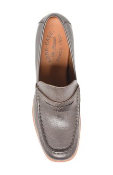 A classic penny keeper and loafer-inspired topline enrich a contemporary leather pump set on a stacked platform and block heel. 3 1/2" heel; 1 1/4" platform Cushioned footbed Leather upper/textile lining/rubber sole Imported Classic Formal Platform Loafers With Rubber Sole, Brown Platform Loafers For Formal Occasions, Classic Office Platform Loafers, Classic Platform Oxfords For Work, Classic Platform Oxfords For Office, Formal Platform Loafers With Moc Toe And Leather Sole, Formal Platform Loafers With Leather Sole, Classic Platform Loafers For Formal Occasions, Classic Formal Platform Loafers With Brogue Detailing