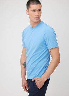 A breathable classic cotton tee enhanced with four-way stretch so you can move freely throughout your day. Reinforced seams mean this tee will hold its shape and help you go the distance. With an ultra-soft touch, this naturally moisture-wicking t-shirt is your new well-dressed yet casual staple. Go The Distance, Blue Clouds, Supima Cotton, Well Dressed, Mens Tees, Bright White, Fabric Care, Cotton Tee, Moisture Wicking