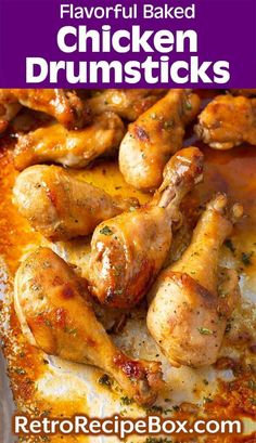 chicken drumsticks in a pan with sauce on top