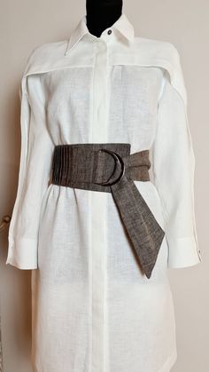 "OBI style wrap belt Wrap style Wide Obi Belt made from natural linen fabric. MORE COLOR AVAILABLE! DETAILS - comes in 10 sizes - Japanese style belt - 100% linen - natural flax color - Fabric: Linen,softened medium weight  SIZES - SIZE 1 - Waist 23\"-25\" = 58-63 cm - SIZE 2 - Waist 25\"-27\" = 64-69 cm - SIZE 3 - Waist 27\"-29\" = 69-74 cm - SIZE 4 - Waist 29\"-31\" = 74-79 cm - SIZE 5 - Waist 31\"-33\" =  79-84 cm - SIZE 6 - Waist 33\"-35\" =  84-89cm - SIZE 7 - Waist 35\"- 37\" = 89-93cm - SIZE 8 - Waist 37\"-39\" = 94-99cm - SIZE 9 - Waist 39\"-41\" = 99-104cm - SIZE 10 - Waist 41\"-43\" = 104-109cm If you need custom Size, please ask me ;)  FABRICS & CARE We use Oeko-Tex certified 100% European linen fabrics which guarantees you that it meets human - ecological requirements. The fabr Fabric Belt Design, Elegant Fabric Belt For Summer, Elegant Summer Fabric Belt, Elegant Beige Fabric Belt, Elegant Beige Belt, Elegant Summer Corset Belt With Belt Included, Elegant Fitted Brown Corset Belt, Elegant Summer Corset Belt, Fabric Belts For Women