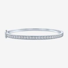 This elegant bangle, featuring 25 Lab-Grown diamonds, is available in two options, sterling silver and 14K gold over silver. Its sleek and modern design makes the piece ideal as a standalone or create an eye-catching stack with other bracelets.Features: Quick ShipCircumference: 7 1/4 InchDiamond Clarity: I1-I2Setting: NickStone Cut: RoundDiamond Color: G-HMetal Color: WhiteChain Width: 5 MillimetersRounded Carat Weight: 1/2 Ct. T.w.Care: Wipe CleanStone Type: 25 Lab Grown DiamondAuthenticity: La Modern White Bracelets With Diamond Accents, White Diamond Jubilee Bangle Bracelet, Classic White Sterling Silver Bangle, Classic White Sterling Silver Bangle Bracelet, Modern White Diamond Bangle Bracelet, Classic White Gold Bracelet For Everyday, White Stackable Diamond Bracelet, White Diamond Stackable Bracelets, Classic White Bangle Tennis Bracelet