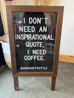 a sign that says i don't need an inspirational quote, i need coffee