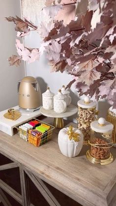 a wooden table topped with lots of different types of food and condiments on top of it