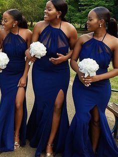 the bridesmaids are all wearing blue dresses